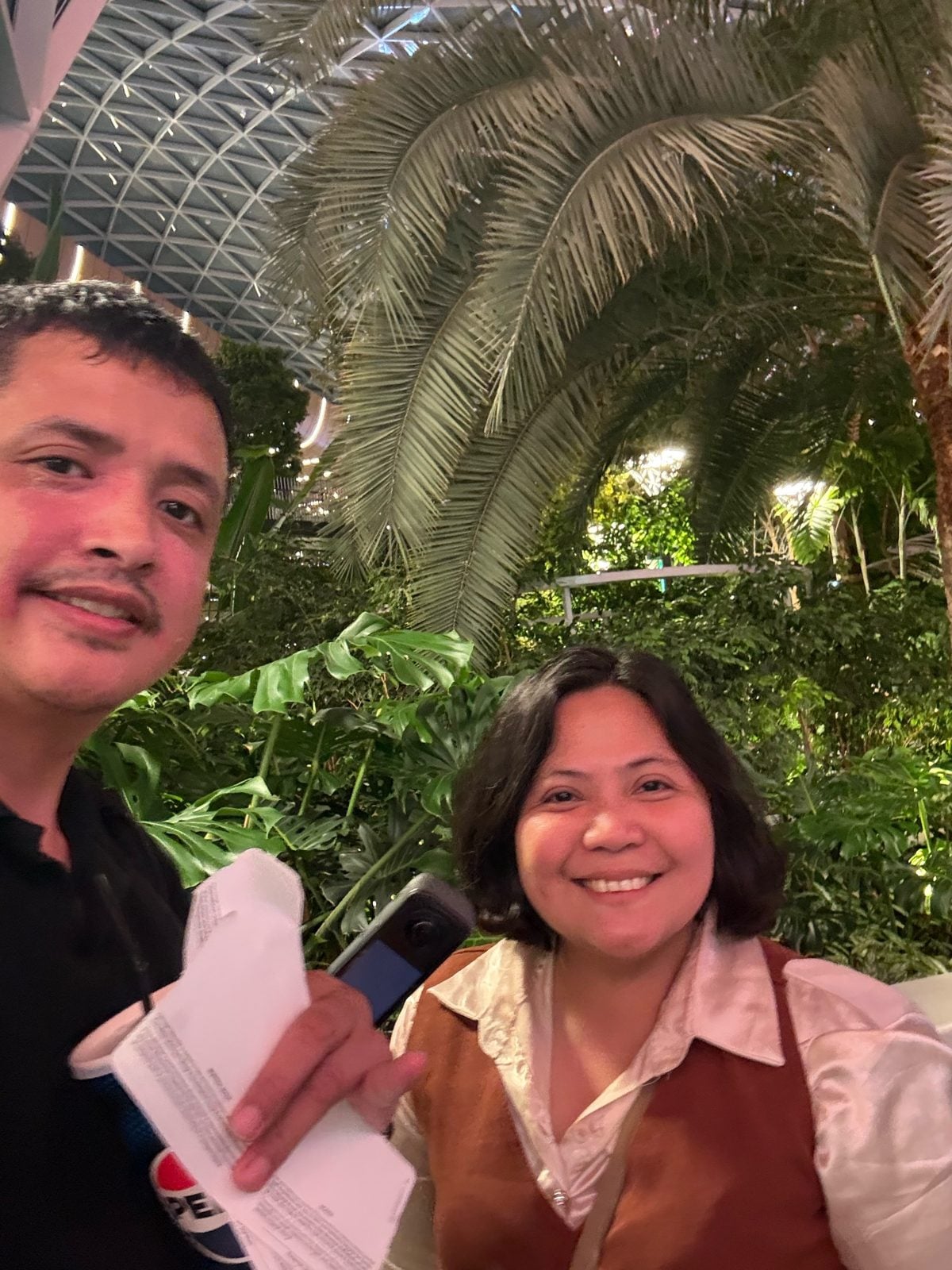 Palm trees in The Orchard, the indoor garden at Hamad International Airport, Doha