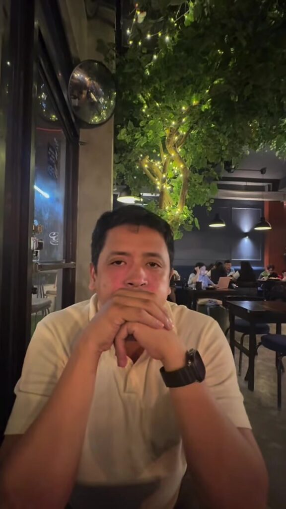 Paolo by the fairy lights at Ambit Cafe & Bar