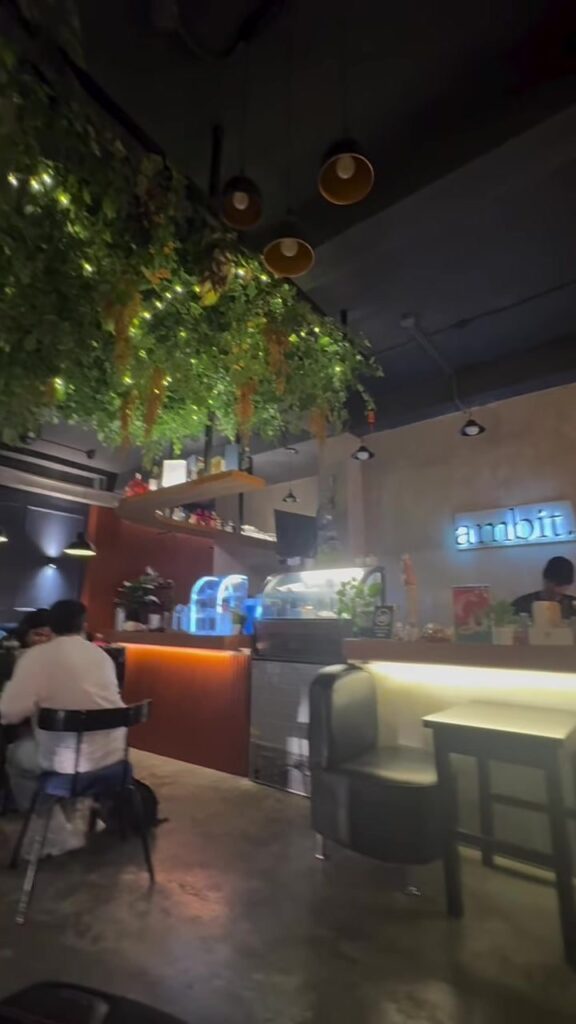 The Ambit sign and bar counter at Ambit Cafe & Bar