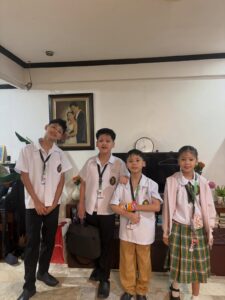 The kids in their school uniforms after finishing periodical exams
