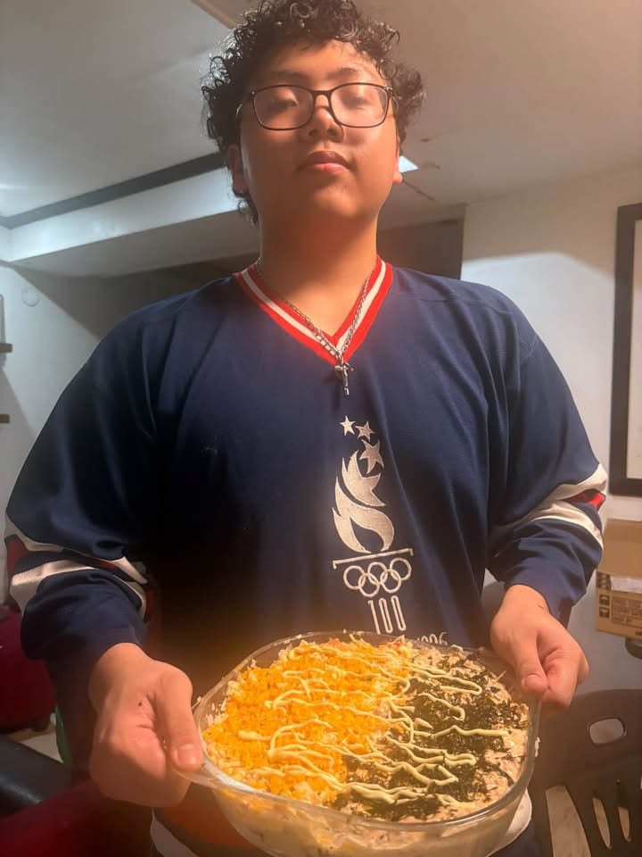 Basti holding his homemade sushi bake