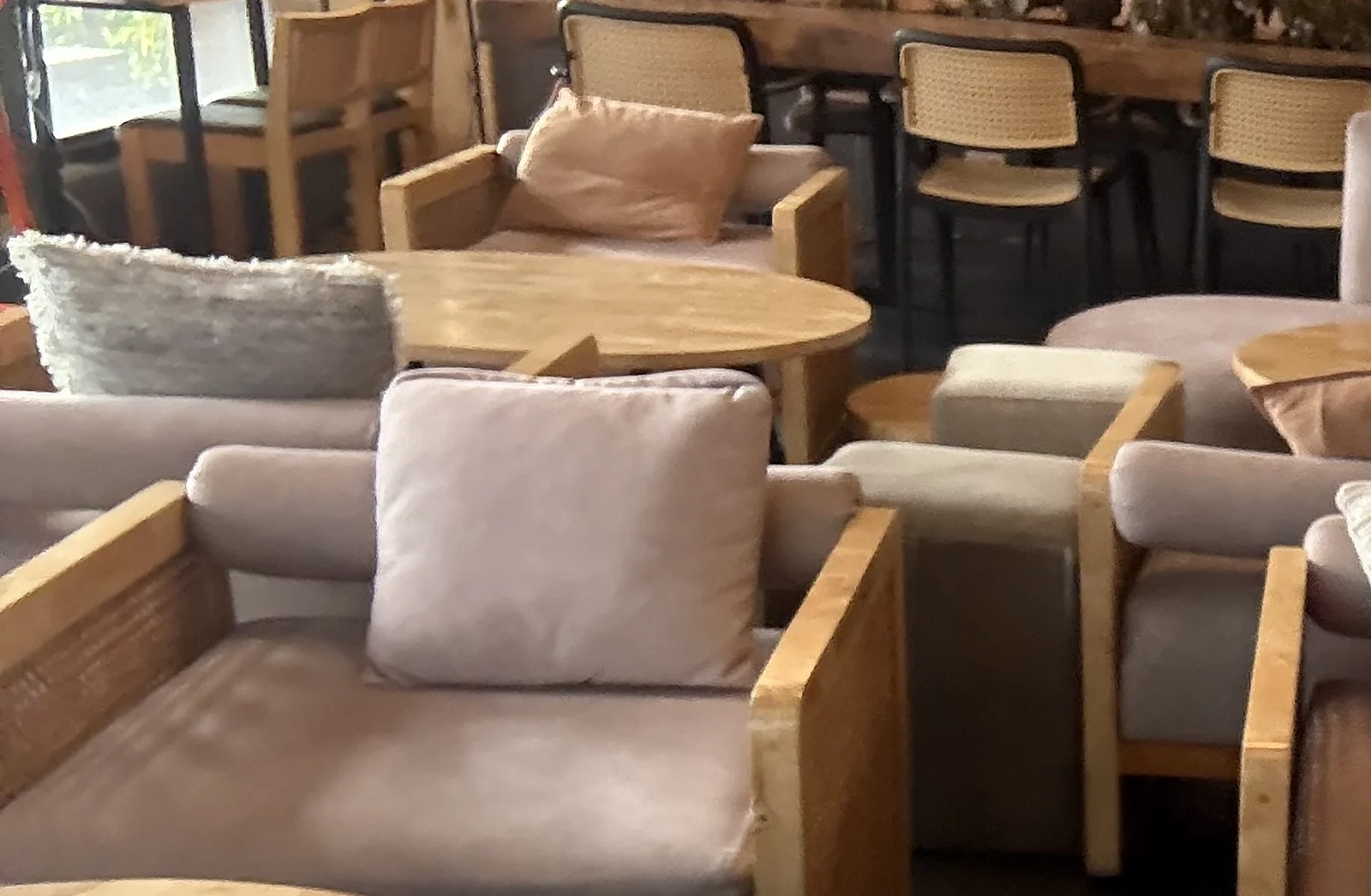 Inside Brew and Barrel New Manila: cozy sofas and wooden tables