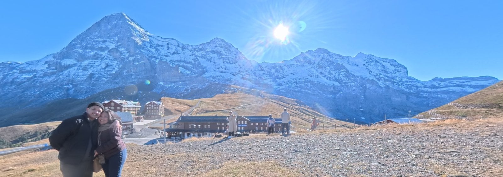 Paolo and Dimple on the hillside at Kleine Scheidegg, with the Eiger, Mönch and Jungfrau in the background