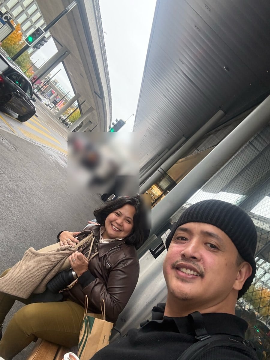 Paolo and Rosed resting on a bench outside Glatt shopping centre