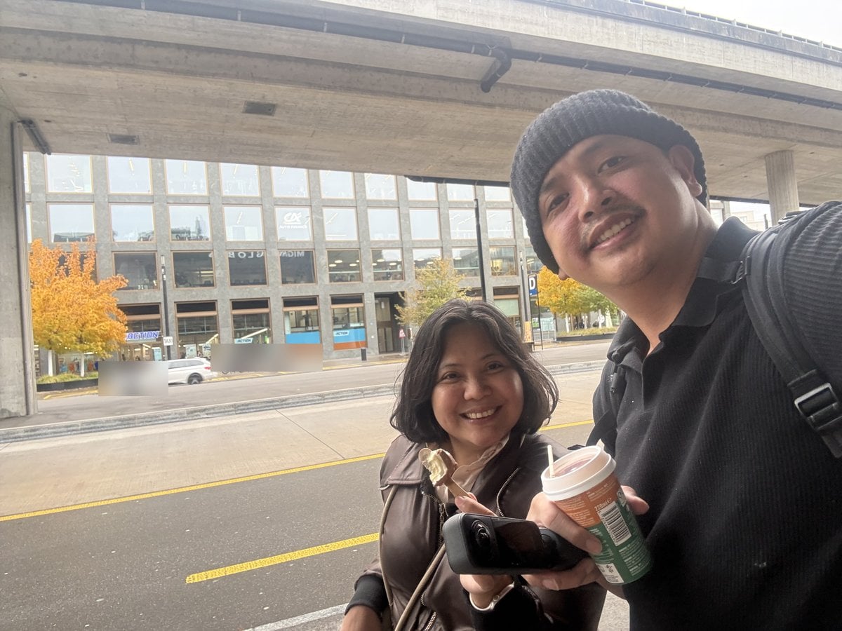 Paolo and Rosed with ice cream and coffee under the overpass outside Glatt