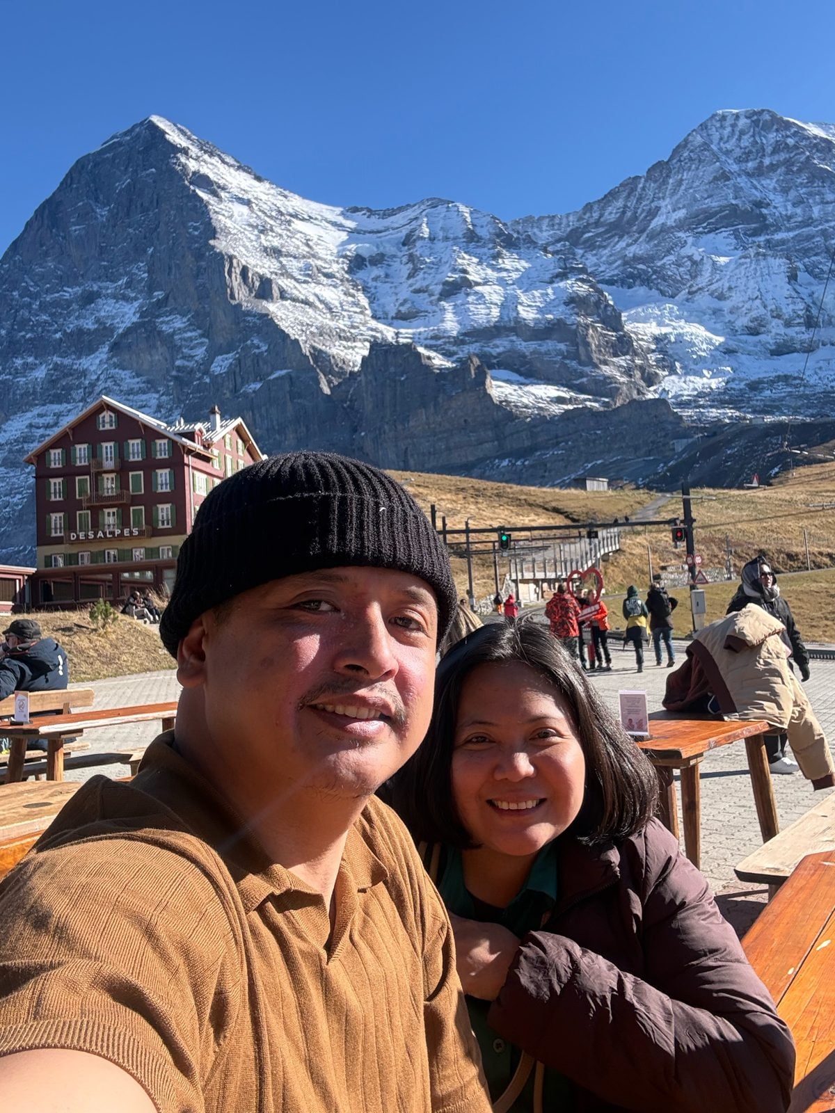 Paolo and Dimple selfie at Kleine Scheidegg with the Eiger behind them