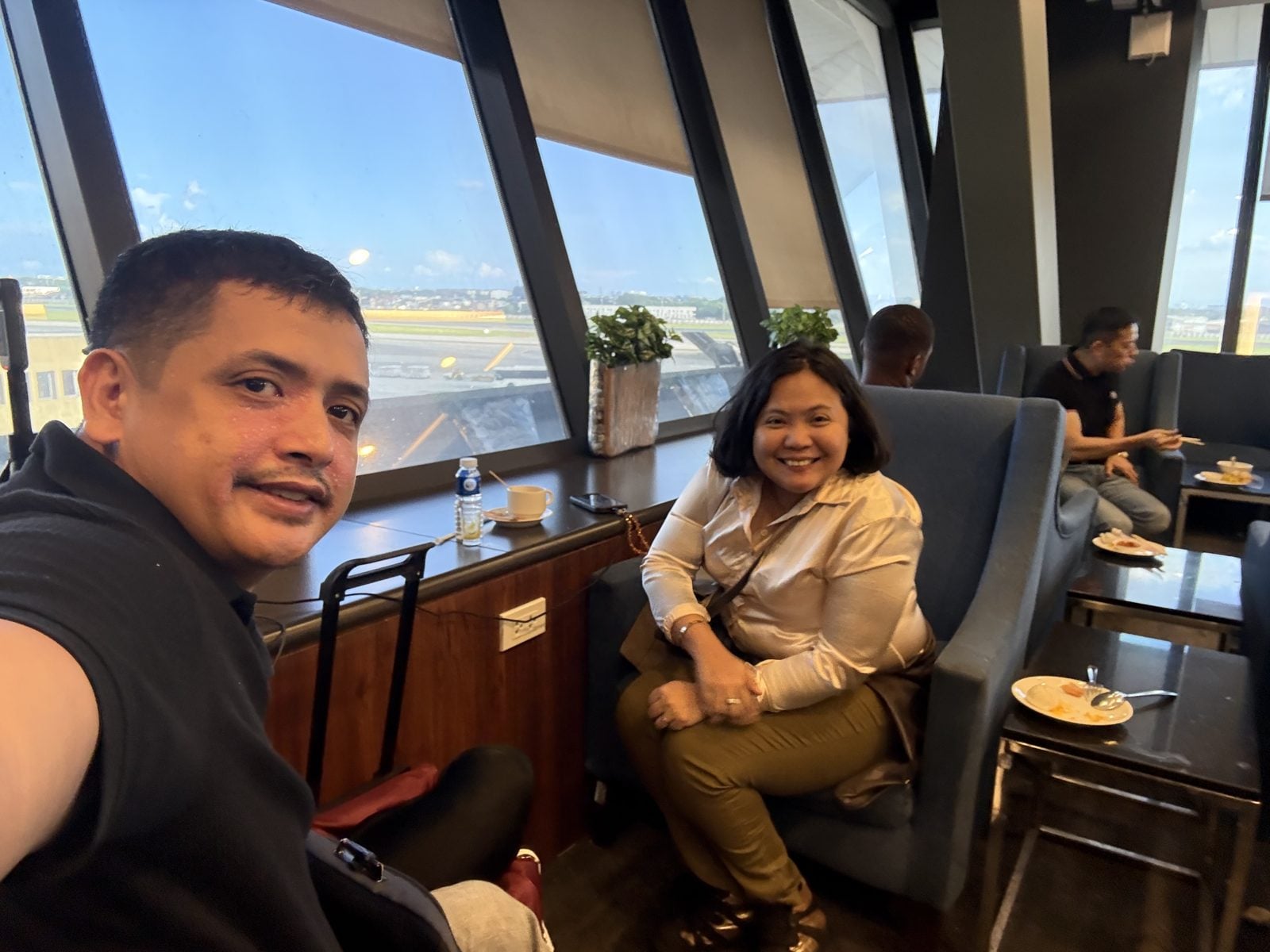 Paolo and Rosed relaxing in the PAGSS lounge at NAIA Terminal 1, Manila