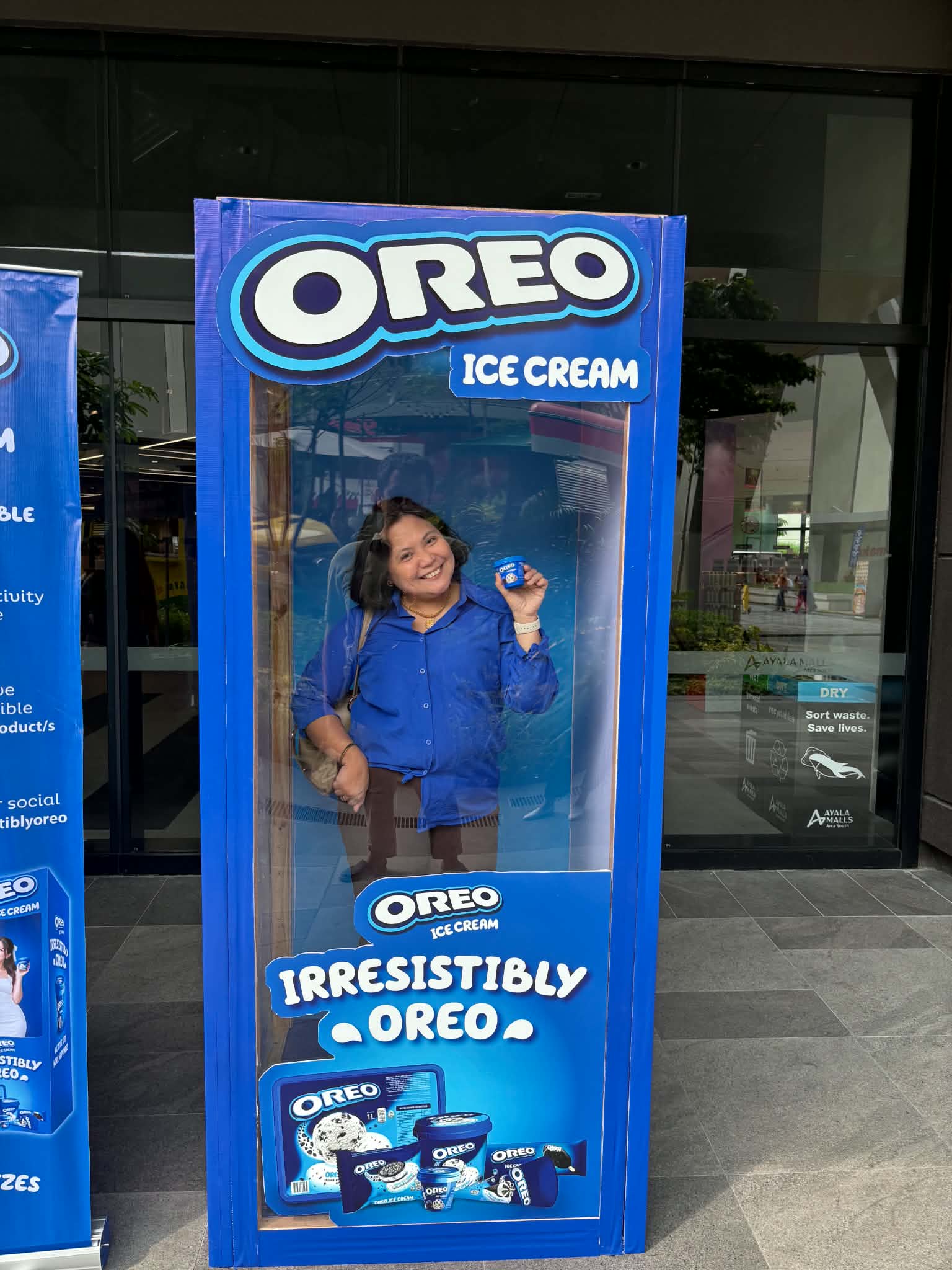 Smiling in the Oreo Ice Cream photo box at Ayala Malls Arca South