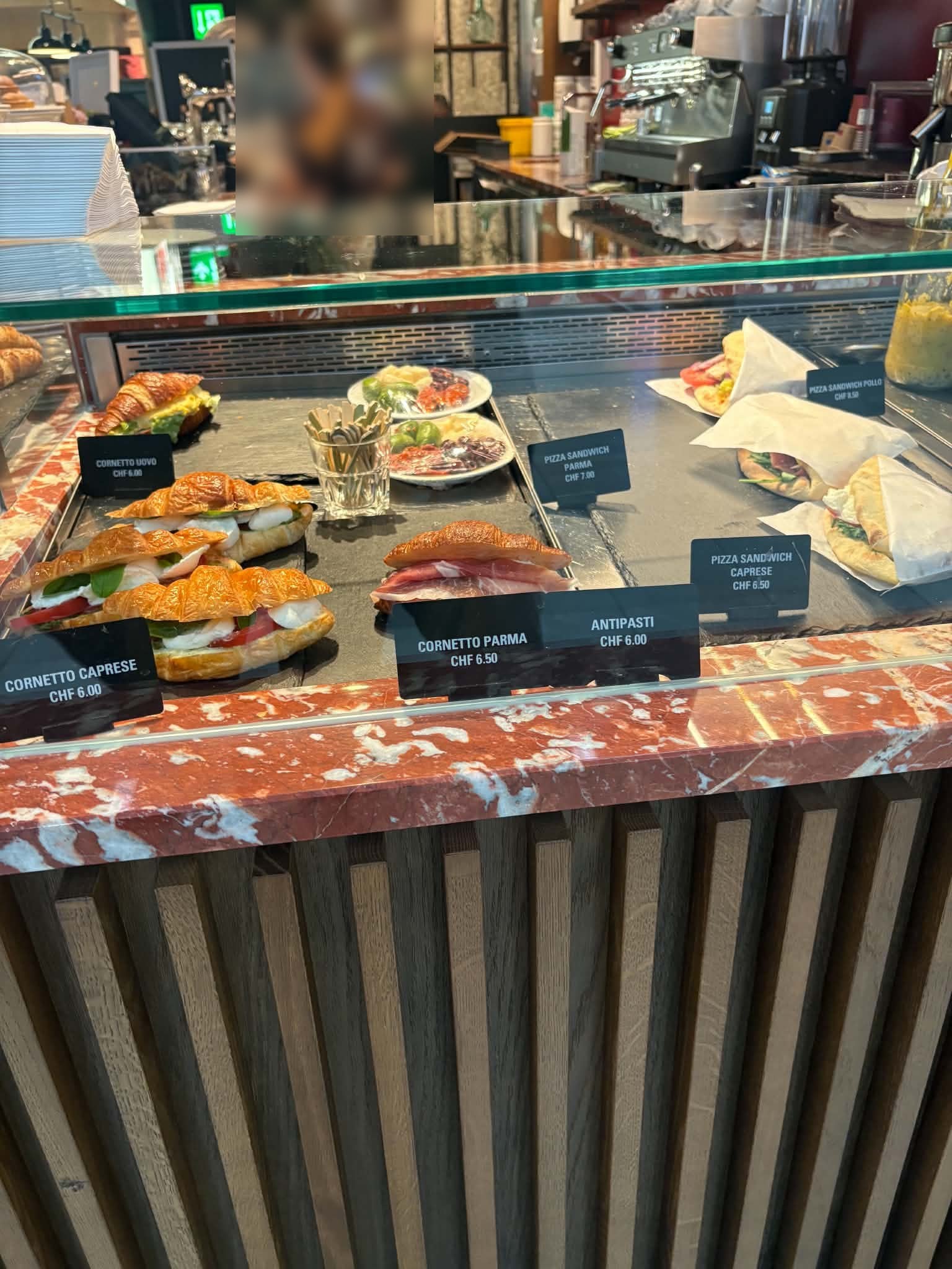 Cornetto Parma and pizza sandwiches in the display case at Ristorante Spiga, Glatt shopping centre near Zurich