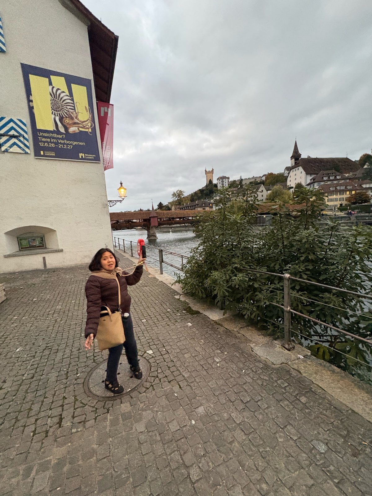 Dimple on the Reuss riverside walk with Spreuer Bridge and the Musegg Wall behind