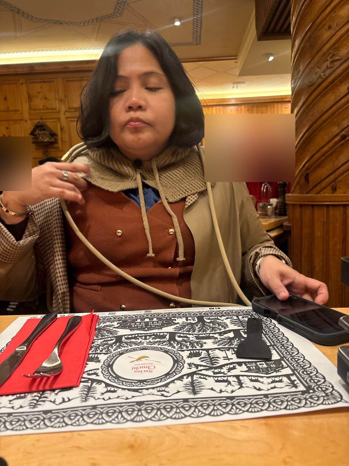 Dimple at the table with the Swiss Chuchi papercut placemat