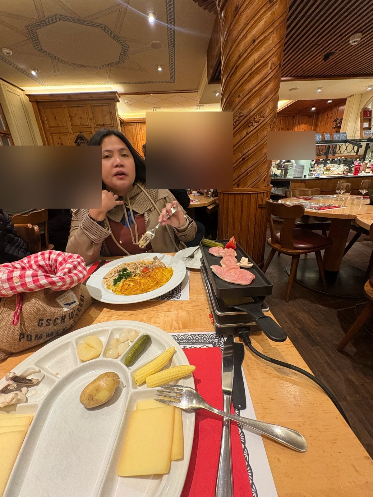 Swiss Chuchi raclette next to Zürcher Geschnetzeltes with rösti
