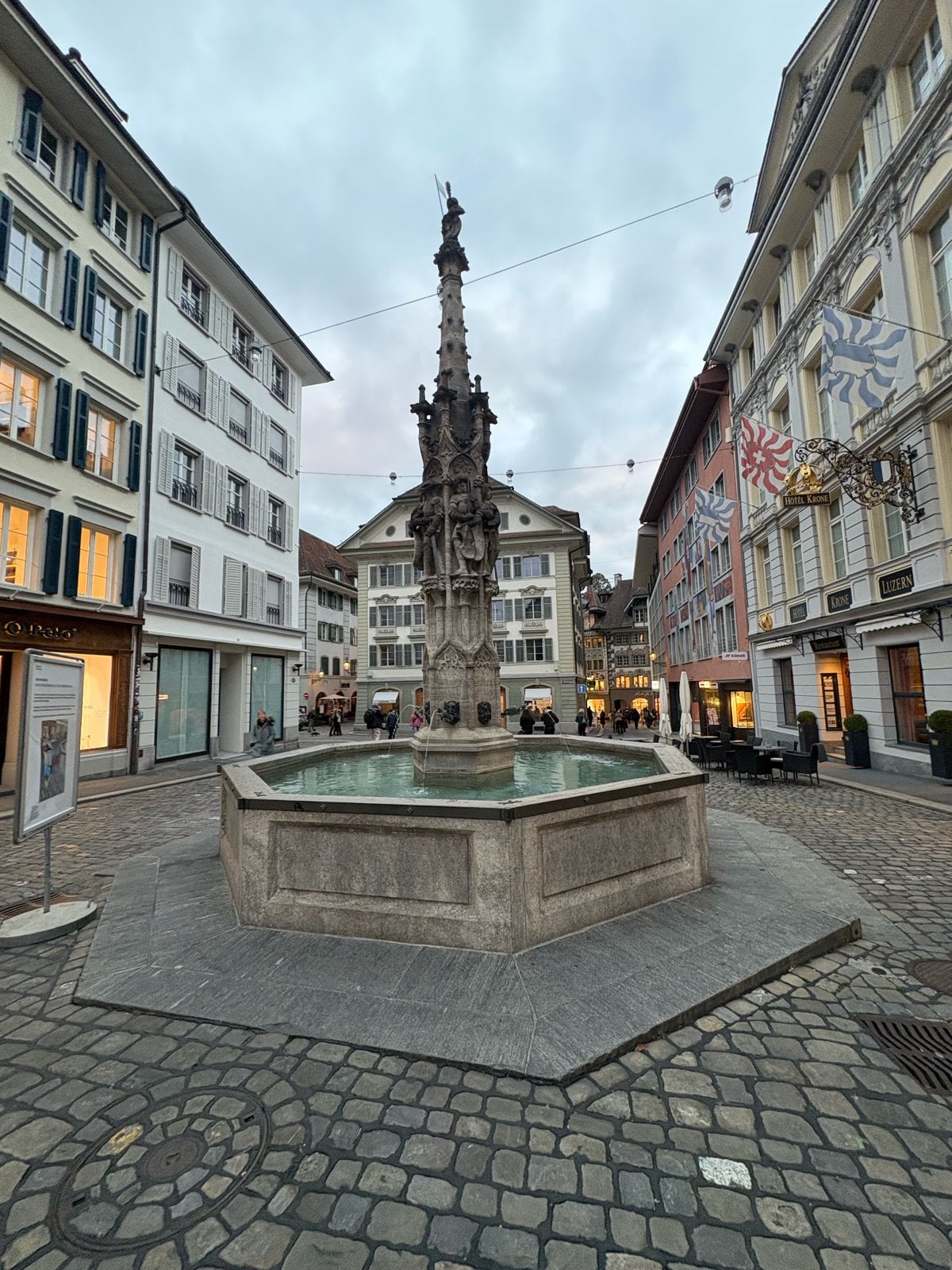 Weinmarkt fountain and Hotel Krone at dusk, Lucerne Old Town