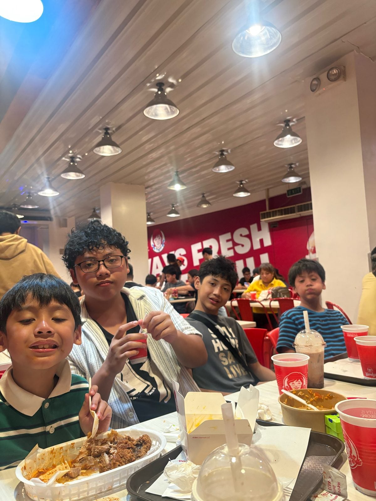 Dinner at Wendy's. Tired, but still smiling.