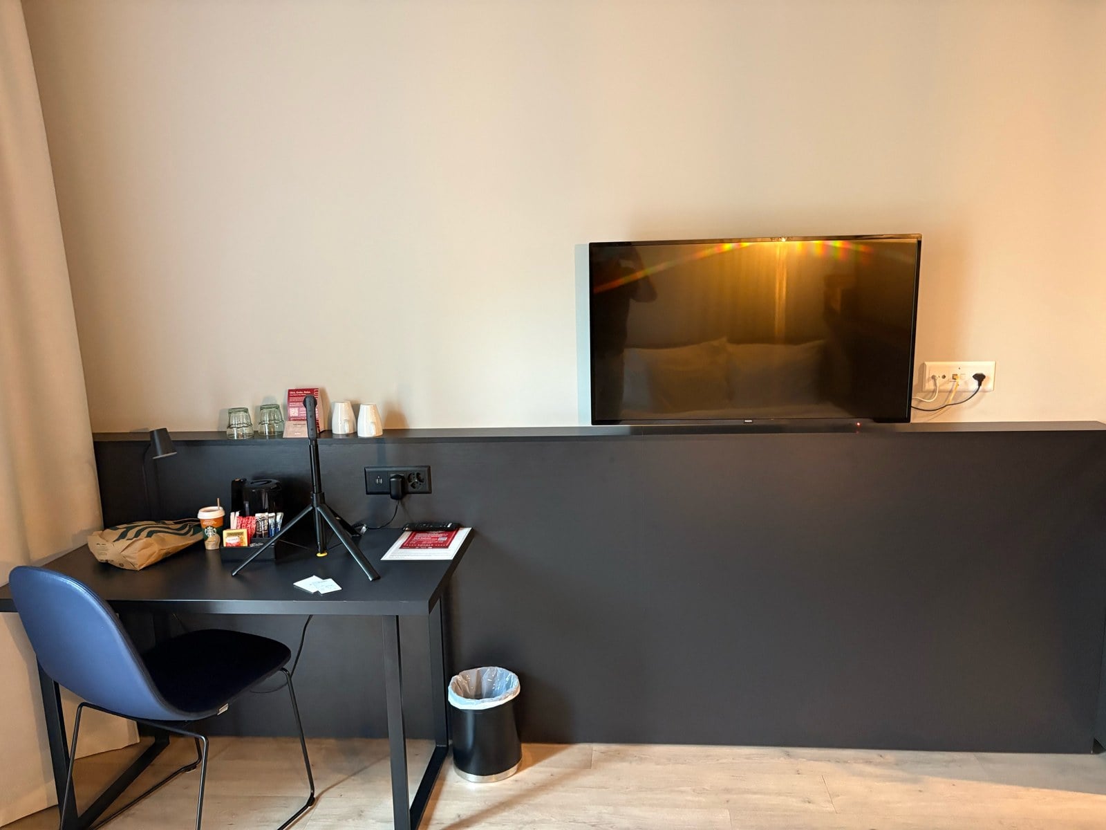 Radisson Hotel & Suites Zurich room desk with TV, kettle and mugs
