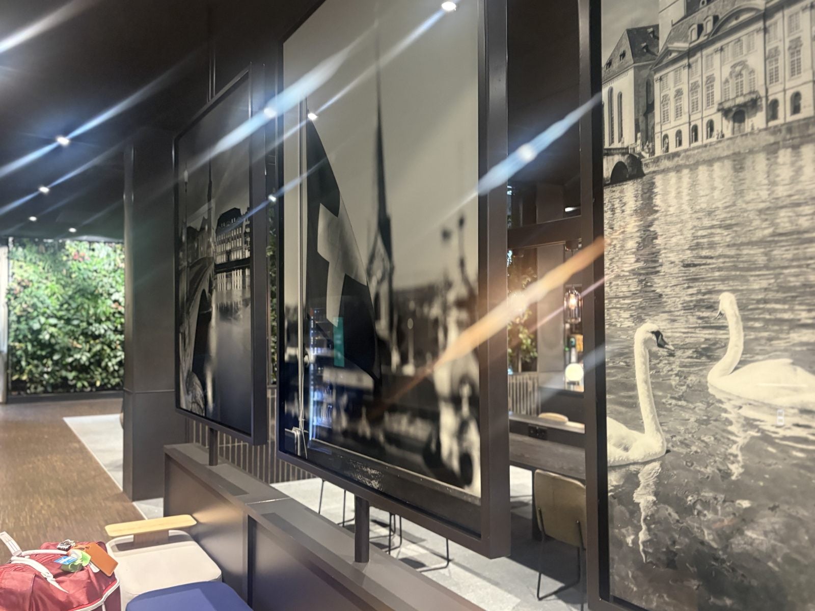 Black-and-white Zurich photo panels in the Radisson Hotel & Suites Zurich lobby