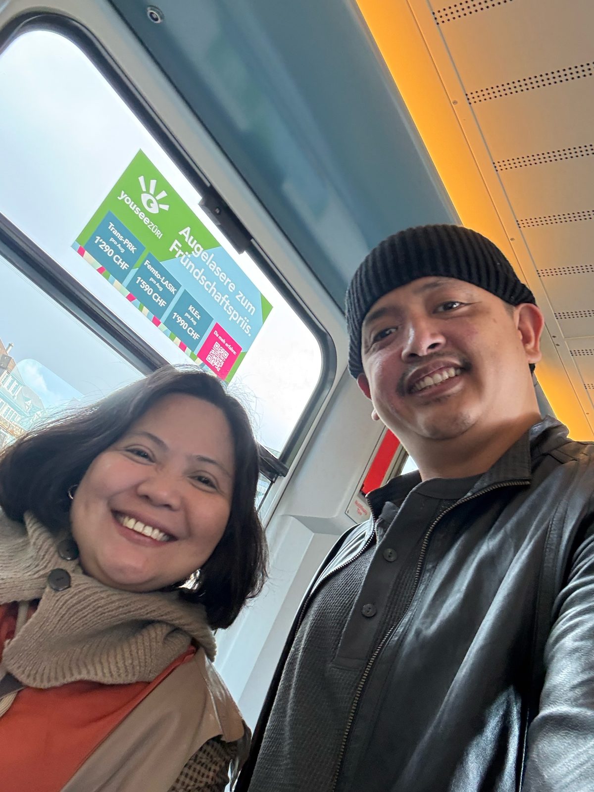 Dimple and Paolo on a Zurich tram heading into the city
